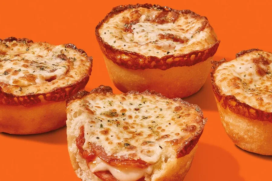 Crazy Puffs Party Pack, a spread of golden pizza puffs