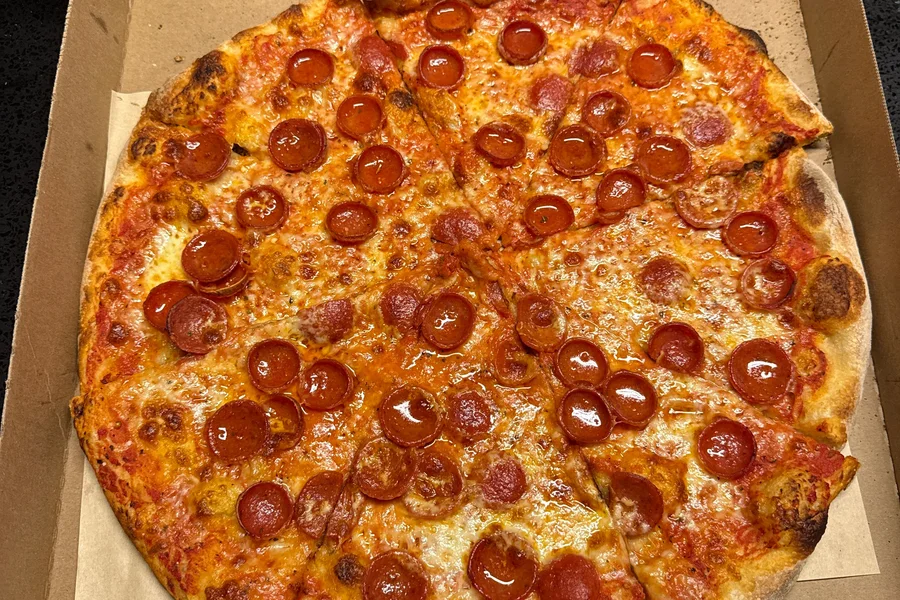 Hot-N-Ready pepperoni pizza in an open box, ready for walk-in pickup