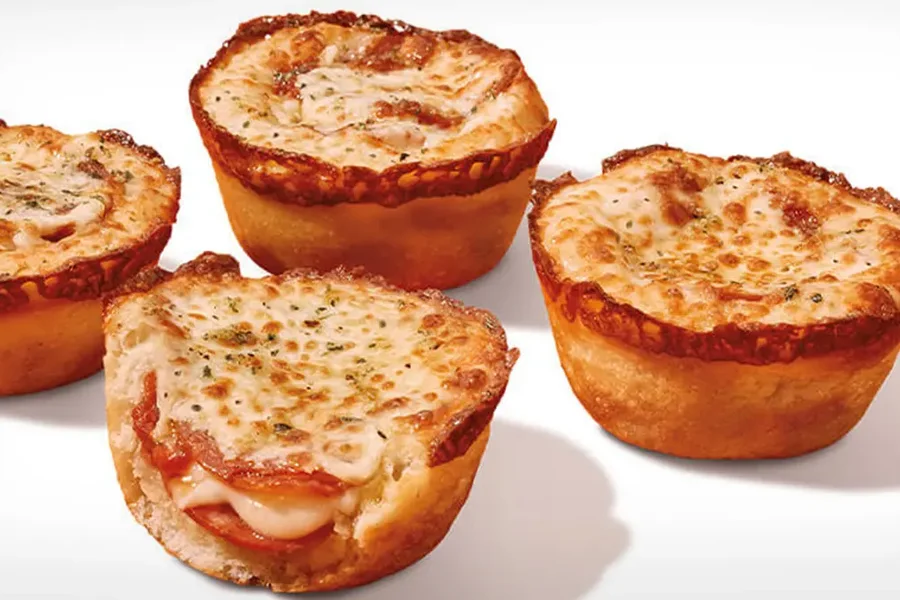 Pepperoni Crazy Puffs, four golden puffs with pepperoni and mozzarella